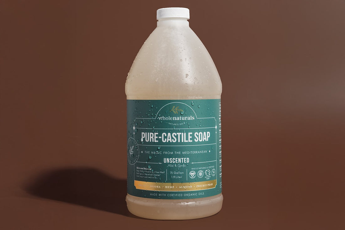 Front label of the 64 fl oz Whole Naturals Pure-Castile Soap bottle, unscented, half gallon, made with certified organic oils